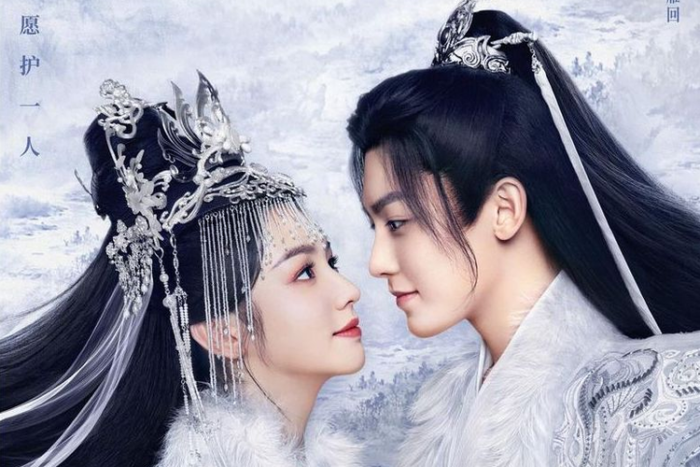 Back From the Brink promo image showing Zhou Ye as Yan Hui on the left and Neo Hou as Tian Yao. They are both wearing elaborate white and silver clothing.