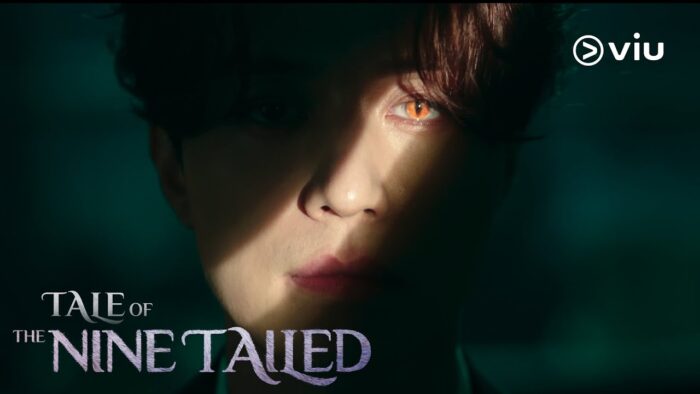 Tale of the Nine-Tailed promo image featuring Lee Dong-wook as the nine-tailed fox Lee Yeon. His face is partially in shadow and a beam of light reveals his golden colored eyes.