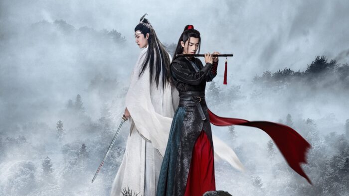 The Untamed promo image featuring Wang Yibo as Lan Zhan on the left wearing white, and Xiao Zhan on the right wearing black and red